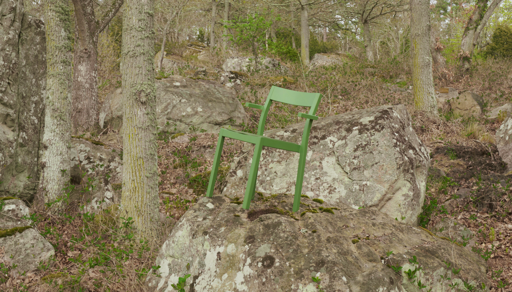 Green chair in nature