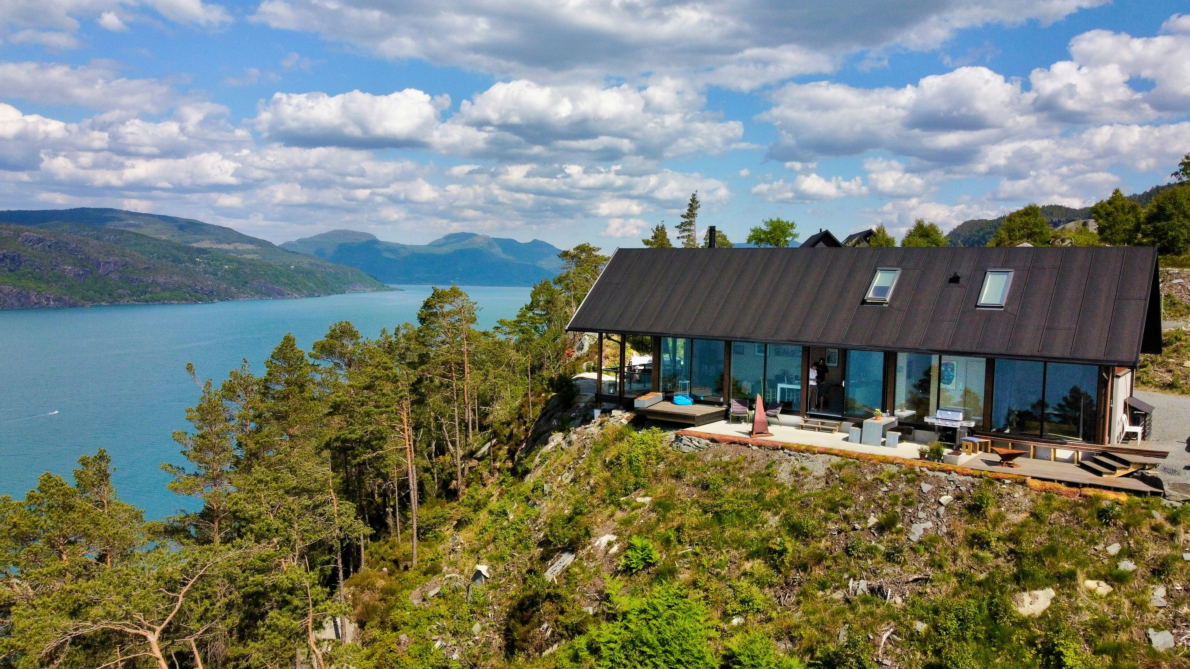Cabins with stunning mountain and sea views cover image